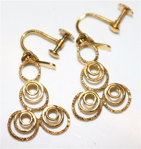 Pair of gold triple loop earrings